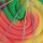 Ein großes Bannerbild, auf dem eine bunt gefärbte Stoffspirale zu sehen ist